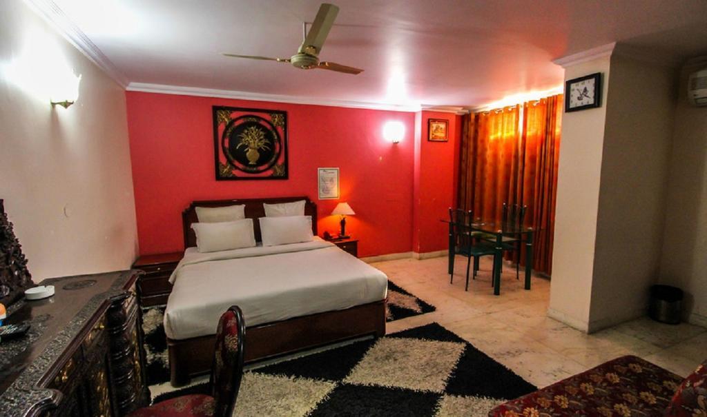 Hotel Pigeon International Бангалор Номер фото