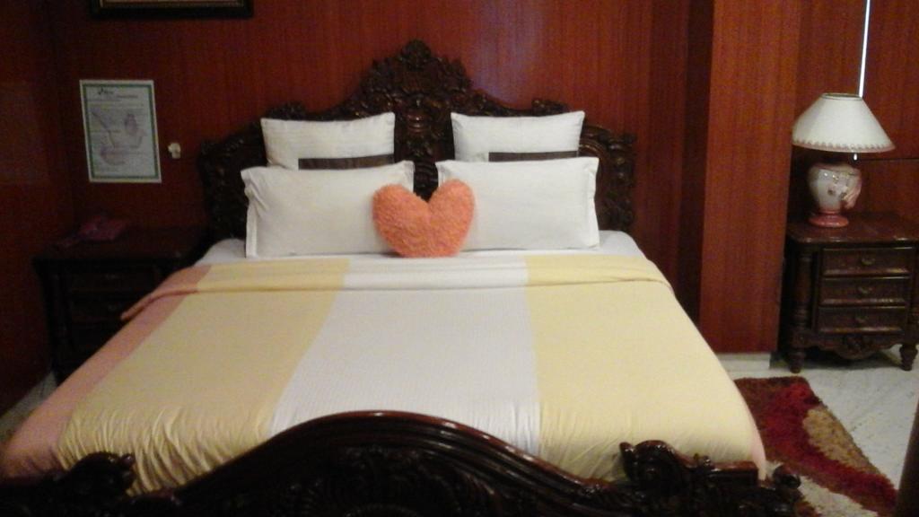 Hotel Pigeon International Бангалор Номер фото
